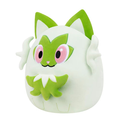 The 10-inch Squishmallows Sprigatito plush, featuring a light mint green body, bright green feline ears, and large embroidered pink eyes