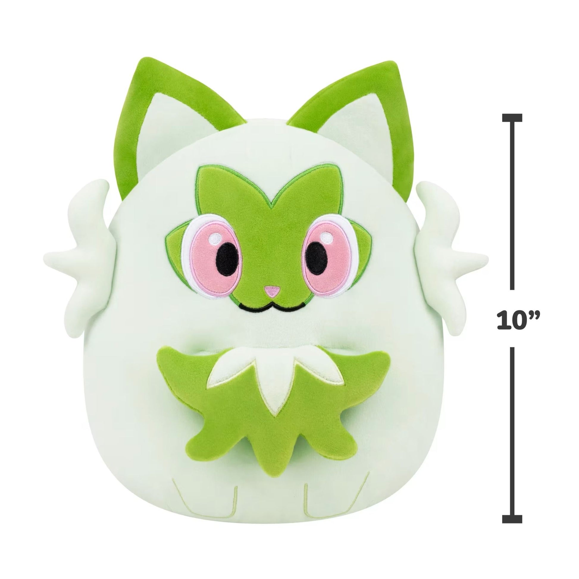 A 10 inch Squishmallows Sprigatito plush, showing the light green body, prominent green leaf mask, and embroidered pink eyes