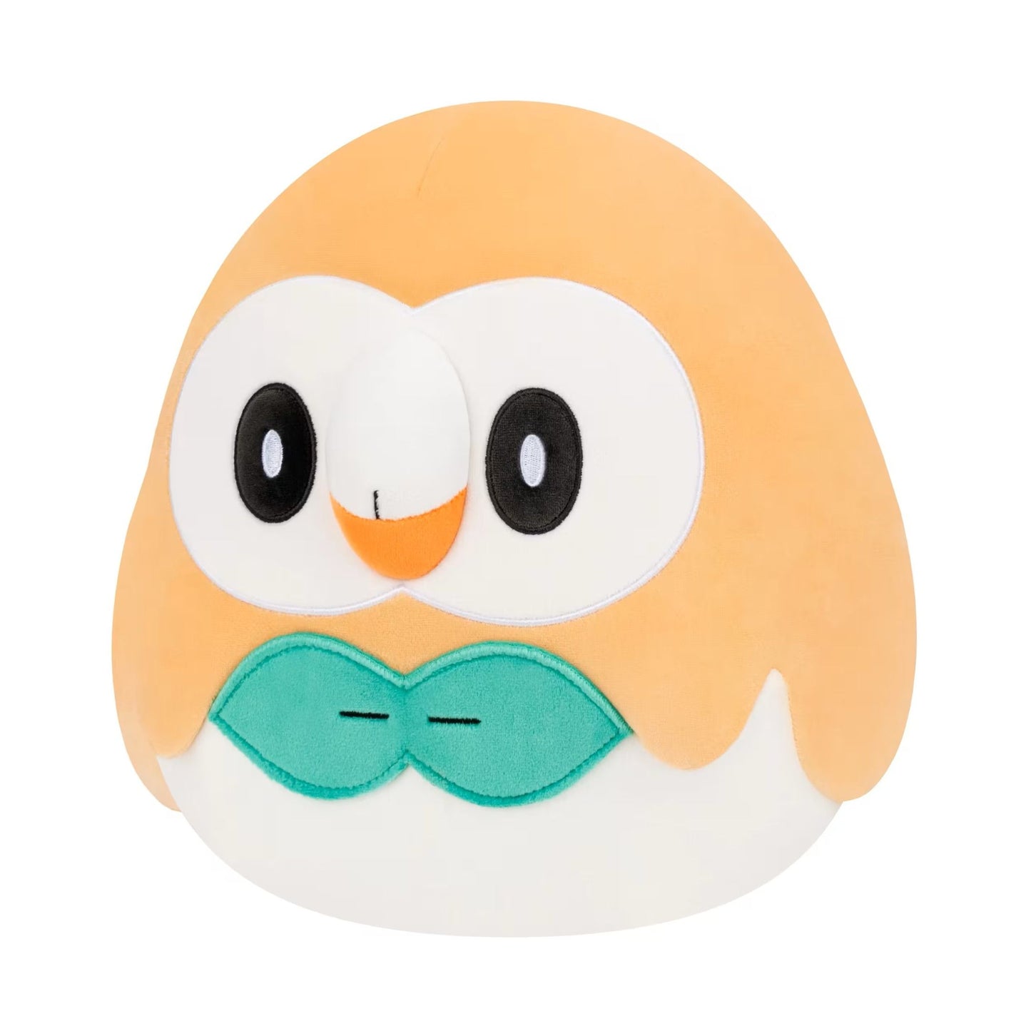 The image displays a 10-inch Squishmallows plush of the Pokémon Rowlet, showing its round tan body, prominent white and black eyes, and signature teal leaf design on its chest