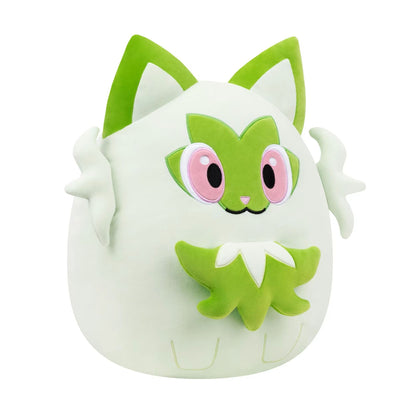 A soft 14-inch Squishmallows plush depicting Sprigatito, which features a mint green body, bright green ears, a leaf mask face, and two attached side paws