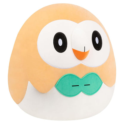 The 20-inch round Squishmallow plush of Pokémon character Rowlet displays its orange and white body, stitched black eyes, and signature bright green leaf detail