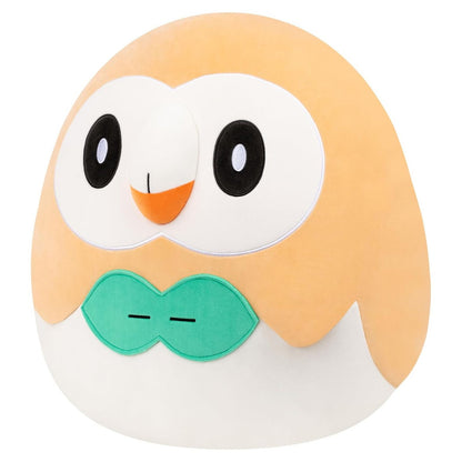 The large 20-inch Squishmallow of Pokémon Rowlet showing its plush round orange body and signature green leaf accent
