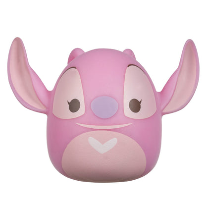 A pink Squooshems Disney Lilo & Stitch Angel toy with large ears, a lavender nose, and a white heart on its chest