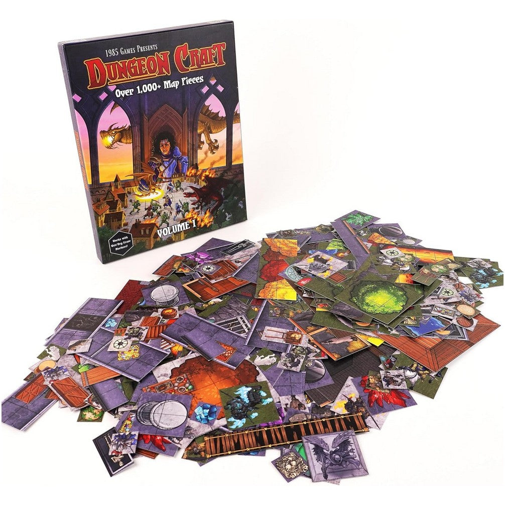 A Dungeon Craft game box stands next to a large pile of its fantasy map tiles