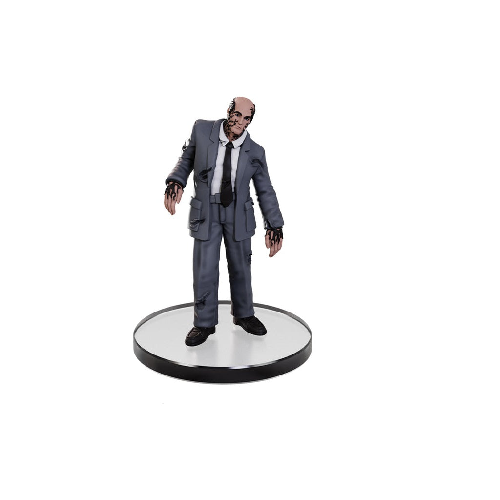 Collectible figure of a scarred man in a tattered gray suit, covered in dark tendrils, standing on a round base