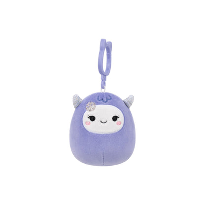 Purple plush creature clip with sparkly horns and a snowflake