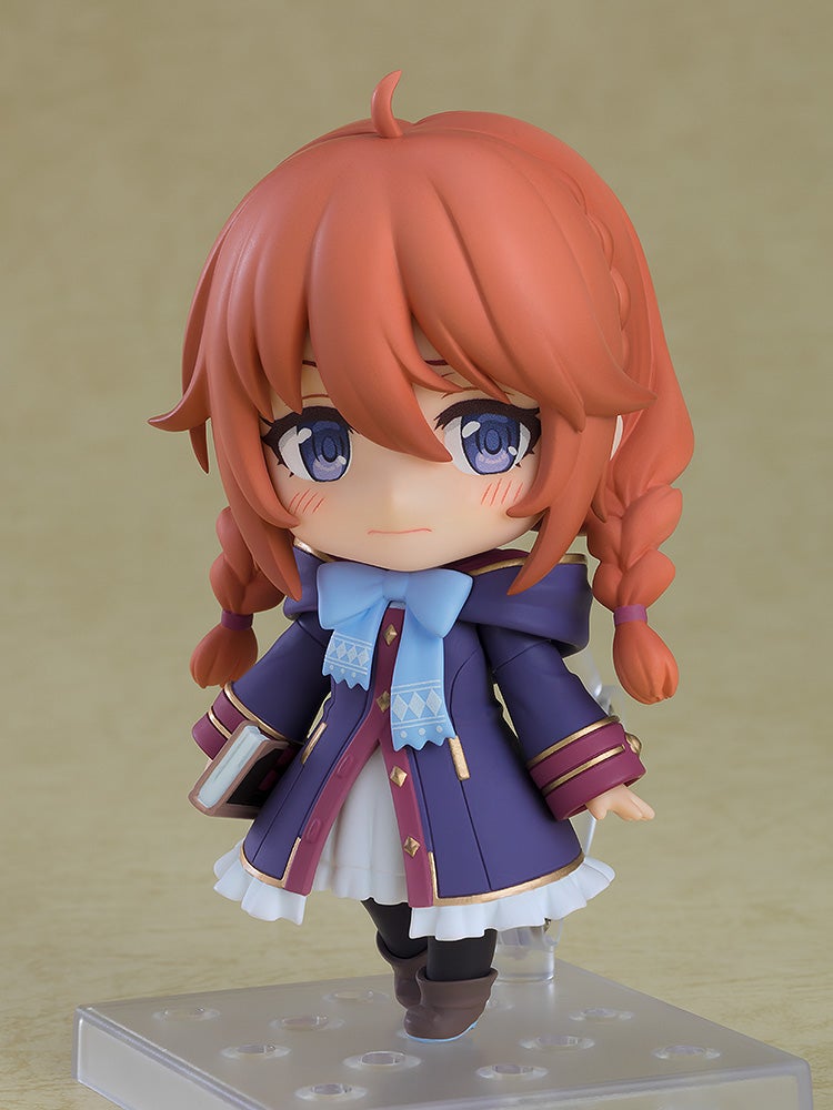 Princess Connect Re Dive Nendoroid Yuni figure with orange hair in braids wearing a purple coat and holding a book