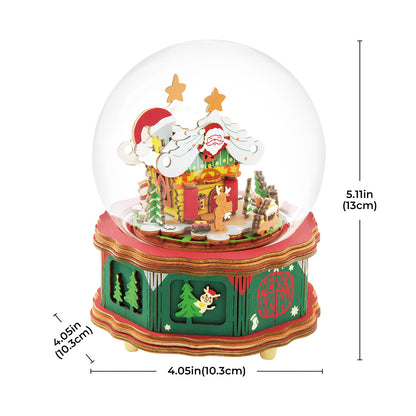 Detailed wooden Christmas snow globe featuring a cabin scene with Santa and reindeer cutouts