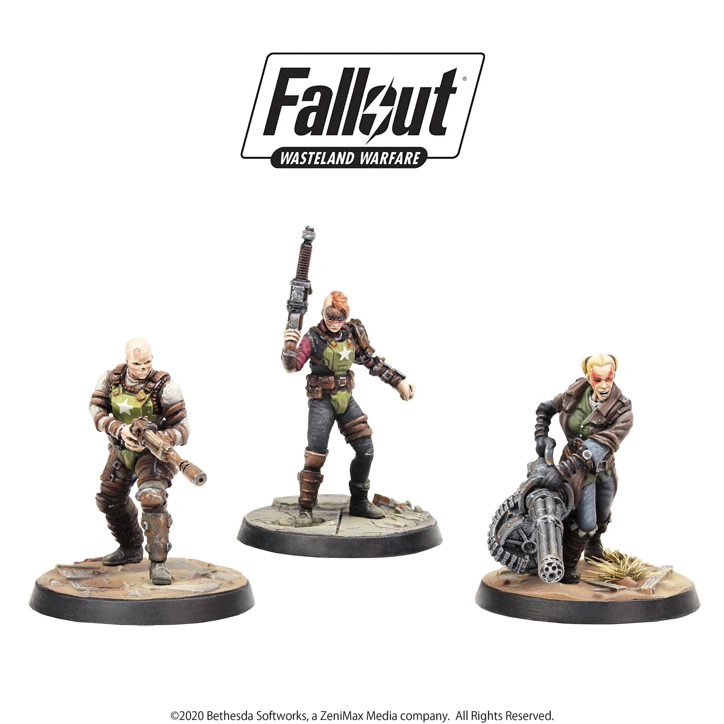 Three miniatures: a bald man with a rifle, a woman with a mohawk holding a weapon, and a woman firing a gatling gun