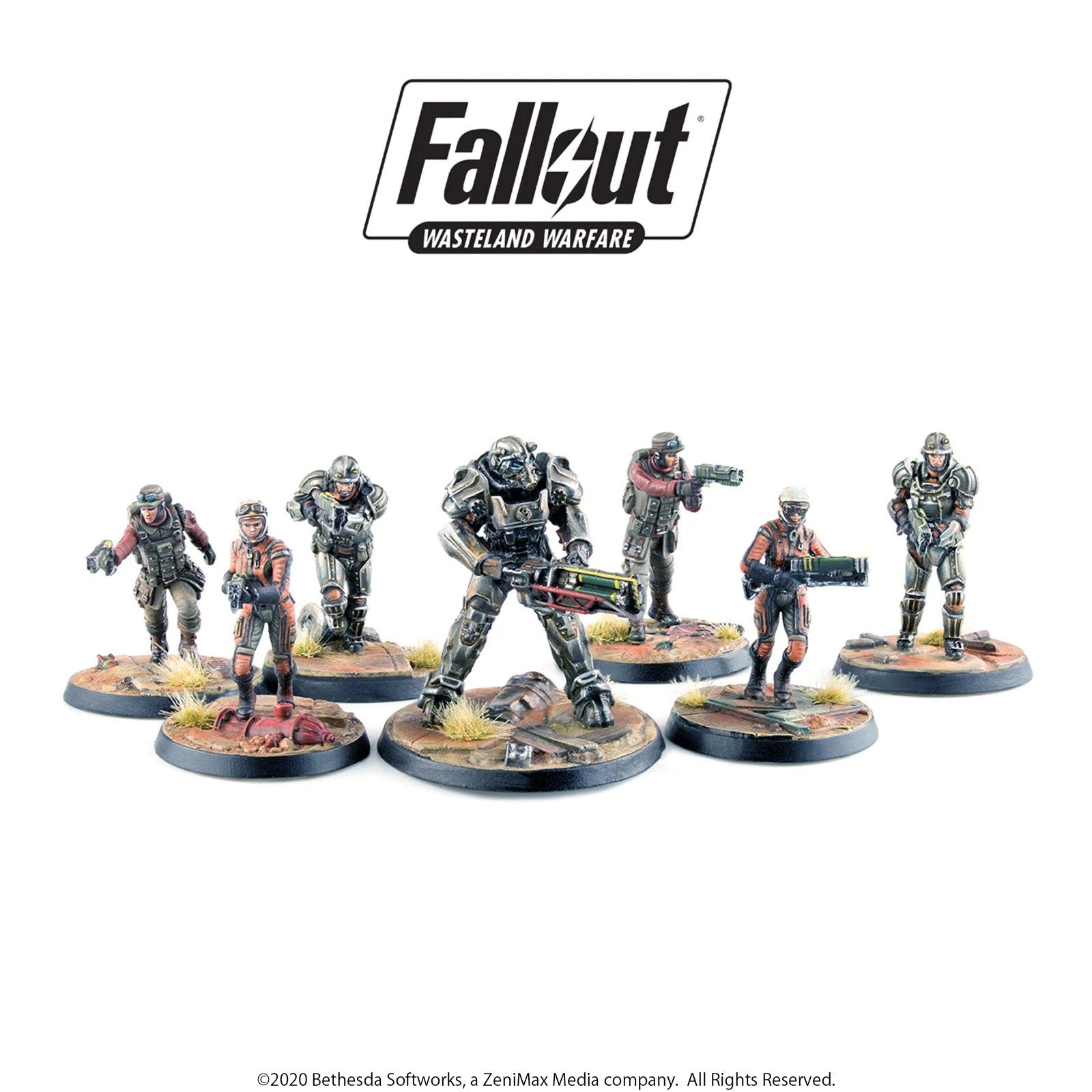 Seven Fallout: Wasteland Warfare miniatures, including power armor, posed with various weapons