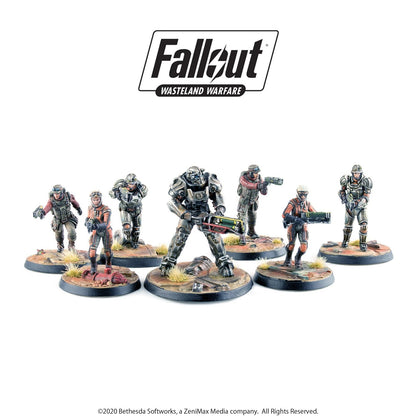 Seven Fallout: Wasteland Warfare miniatures, including power armor, posed with various weapons