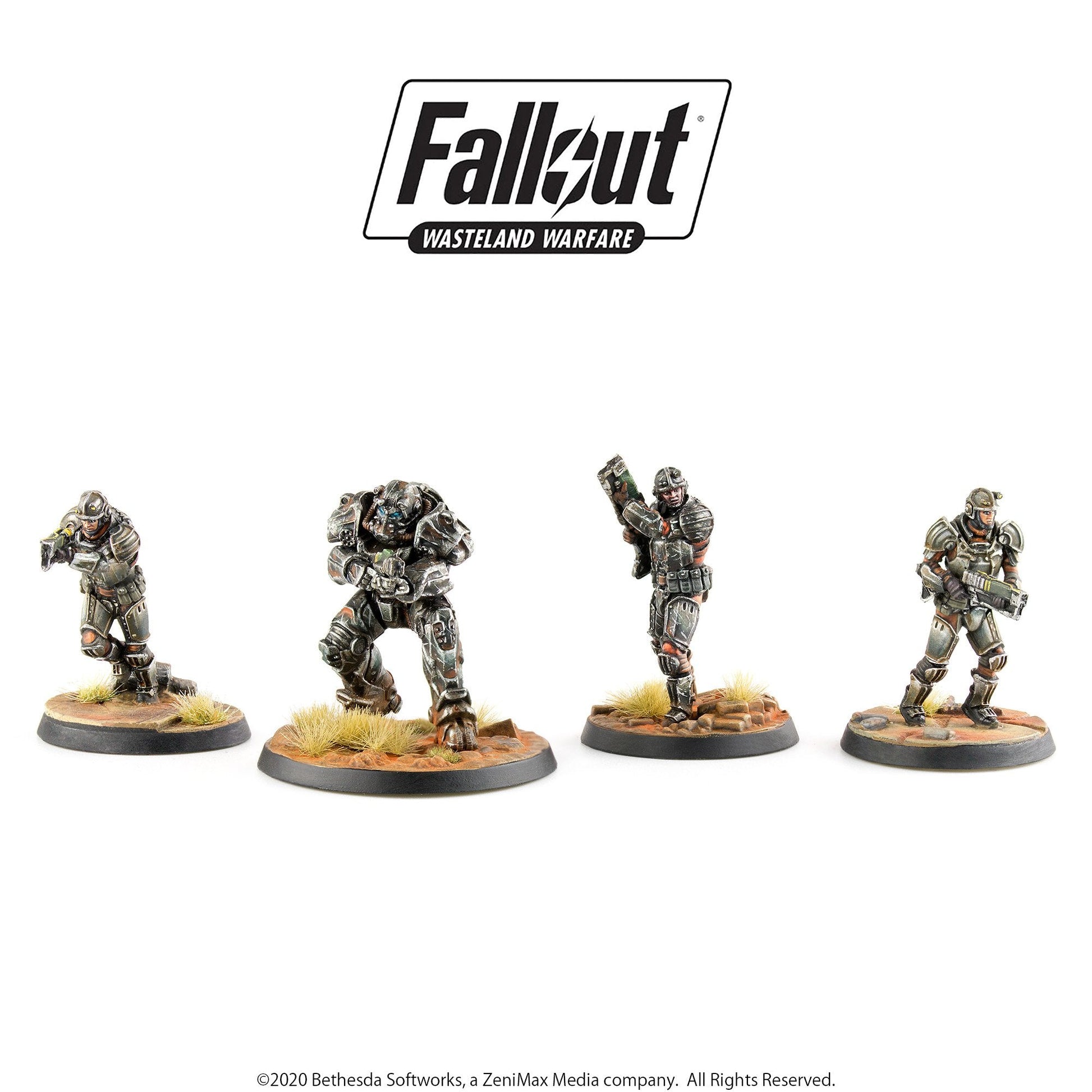 Four painted Fallout Wasteland Warfare armored soldier miniatures in dynamic poses, holding weapons