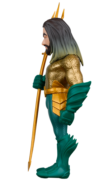 A stylized Aquaman figure is seen in profile, wearing gold scaled armor and green pants with a hexagonal pattern, holding a golden trident