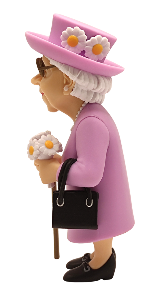 Side view of Minix Queen Elizabeth II vinyl figure in a pink coat and hat with white daisy details holding a black handbag and flowers with a walking stick