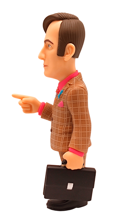 Side view of Minix Better Call Saul Saul Goodman vinyl figure in a brown plaid suit pink shirt colorful tie and blue ribbon holding a briefcase