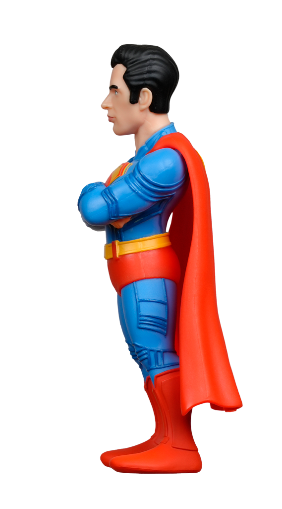 Side view of the MINIX DC Comics Superman 2025 Figure with arms crossed, wearing his iconic blue, red, and yellow suit with cape