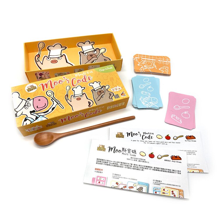 Children playing Jolly Thinkers Pets Moo&#39;s Code Card Game on a table with cards and game pieces