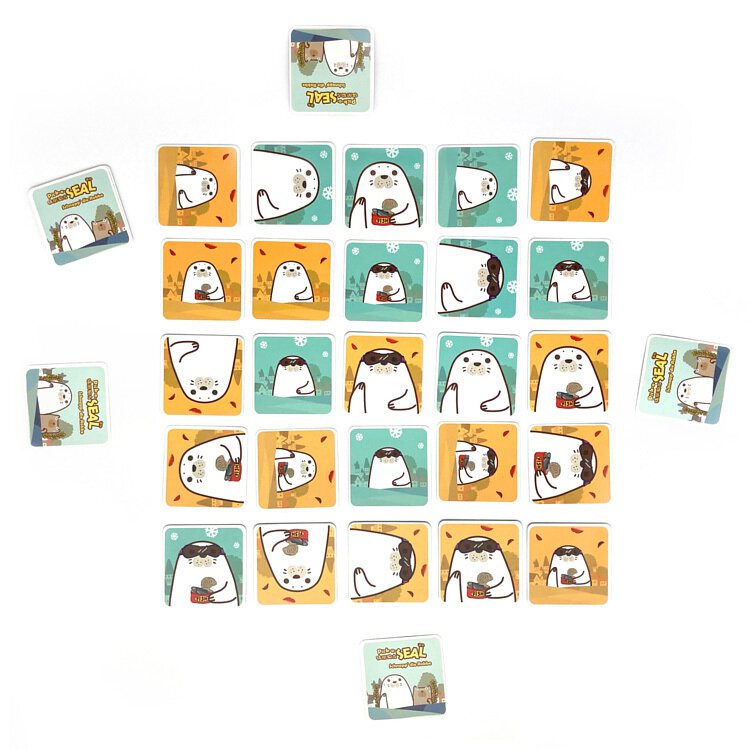 Close-up of Jolly Thinkers cards fanned out showing various colorful illustrations and icons used during gameplay