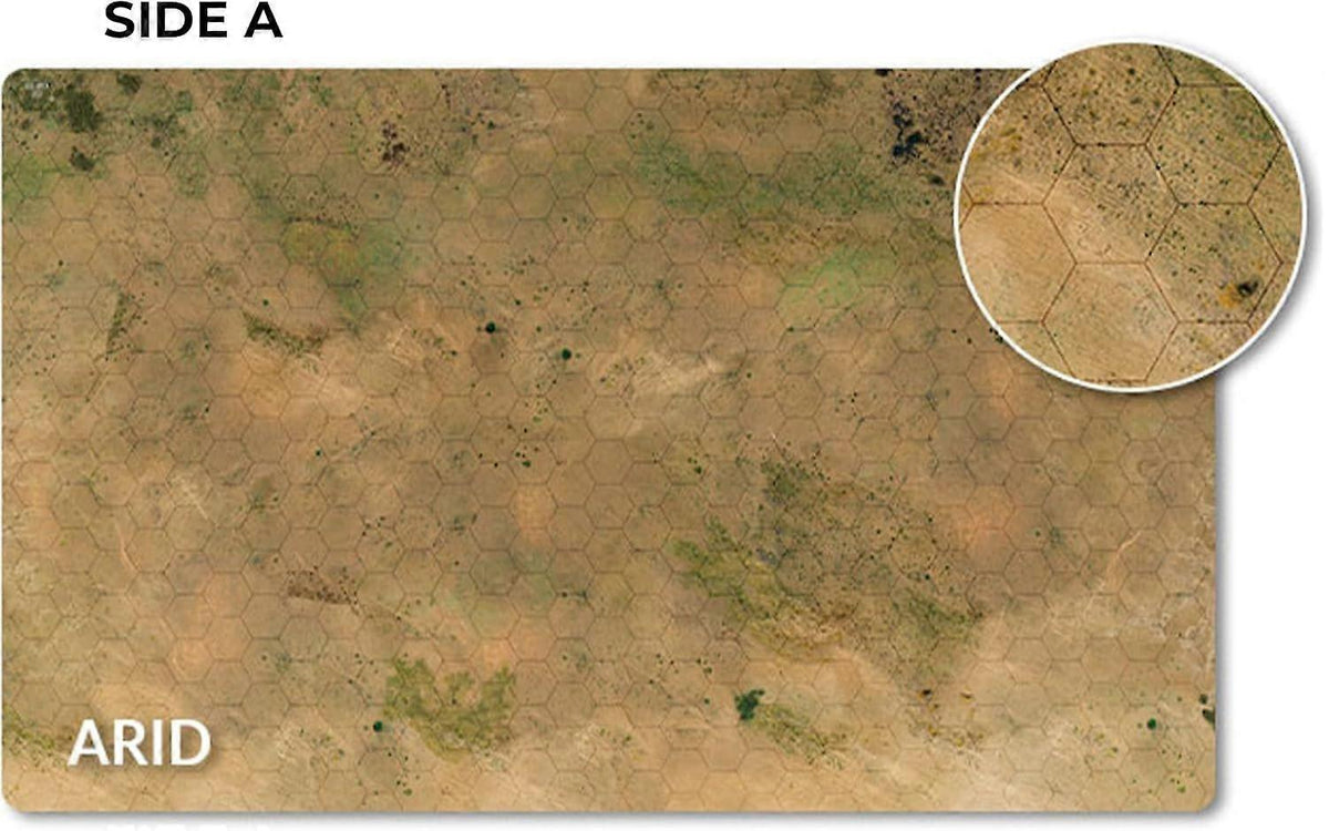 An arid hexagonal game mat depicting a dry, sandy landscape with sparse green patches and a visible grid