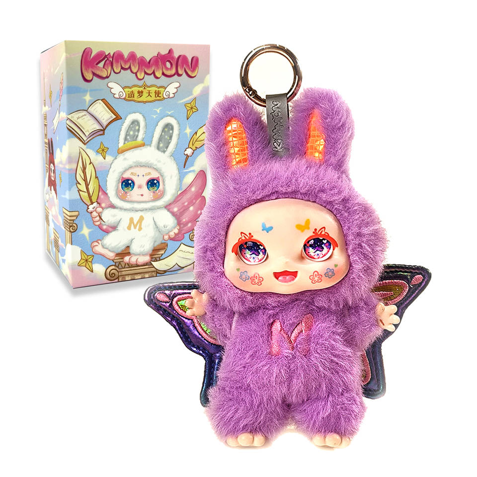 Fluffy purple bunny keychain doll with iridescent butterfly wings, glitter eyes, next to its Kimmon blind box packaging