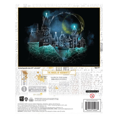 Harry Potter: Magic of Hogwarts Glow-in-the-Dark 1000-piece puzzle box: stylized castle glowing blue-green under a large yellow moon