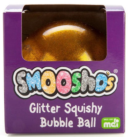 Gold glitter Smoosho's Squishy Bubble Ball in purple retail packaging