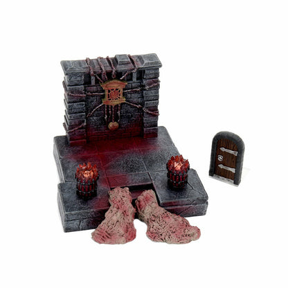 Bloody dungeon terrain featuring a brick wall with chains, two glowing braziers, grotesque fleshy mounds, and a small arched door