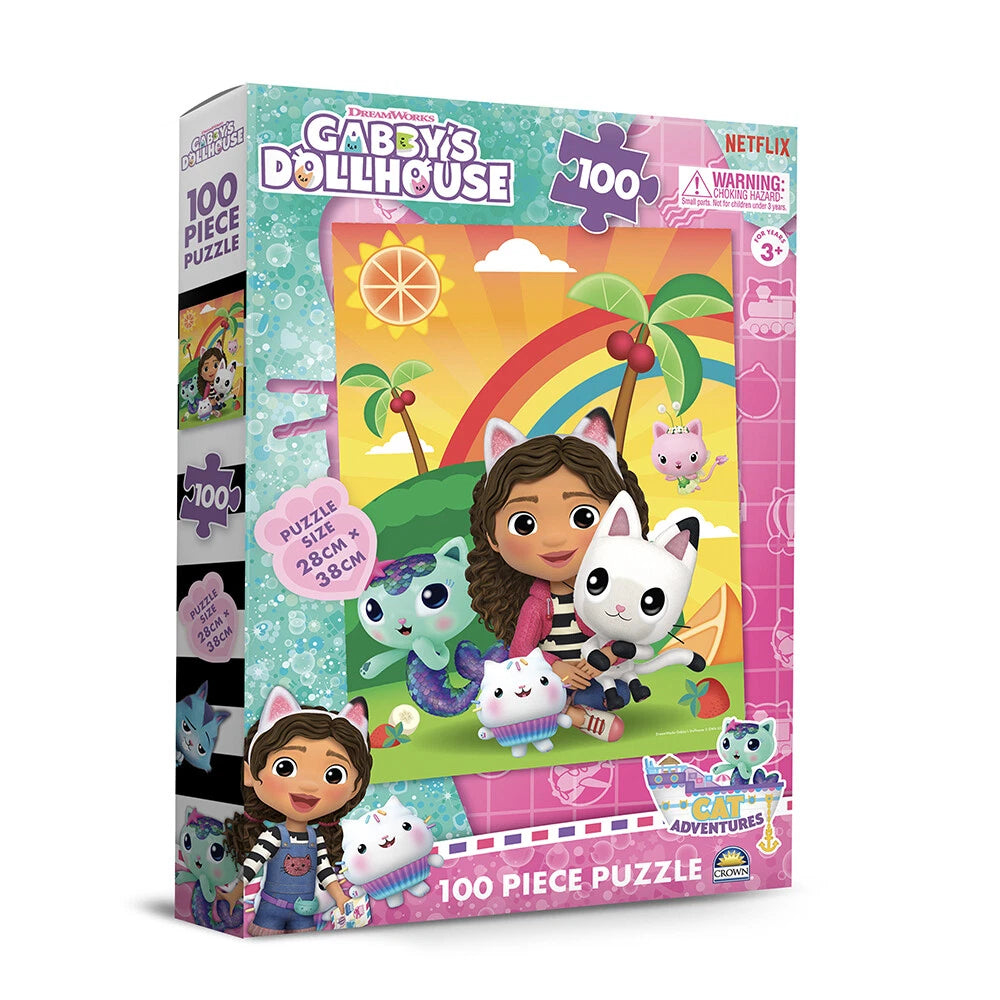 Gabby's Dollhouse 100-piece puzzle box. Gabby, a girl with cat ears, holds a white cat surrounded by other cat friends on a rainbow beach.