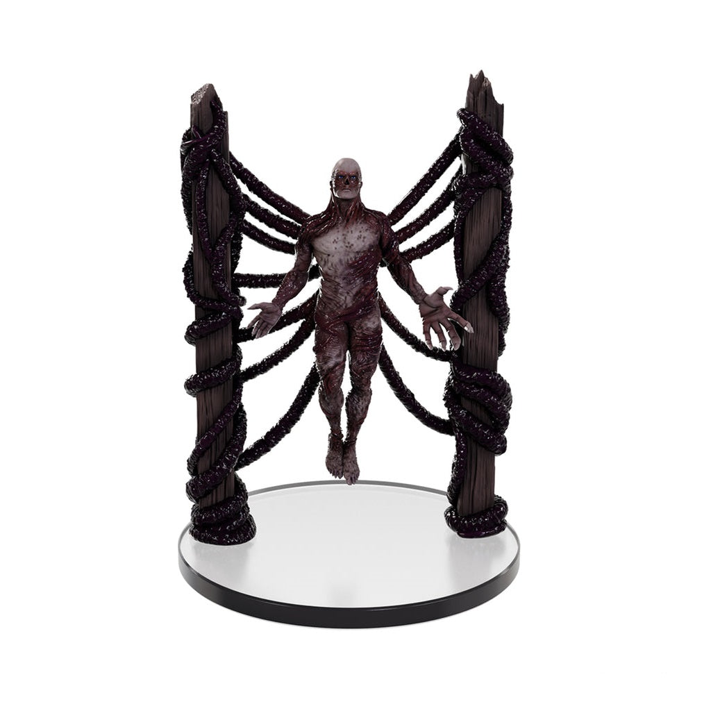 Vecna collectible figurine, suspended by dark vines between two wooden posts on a circular base