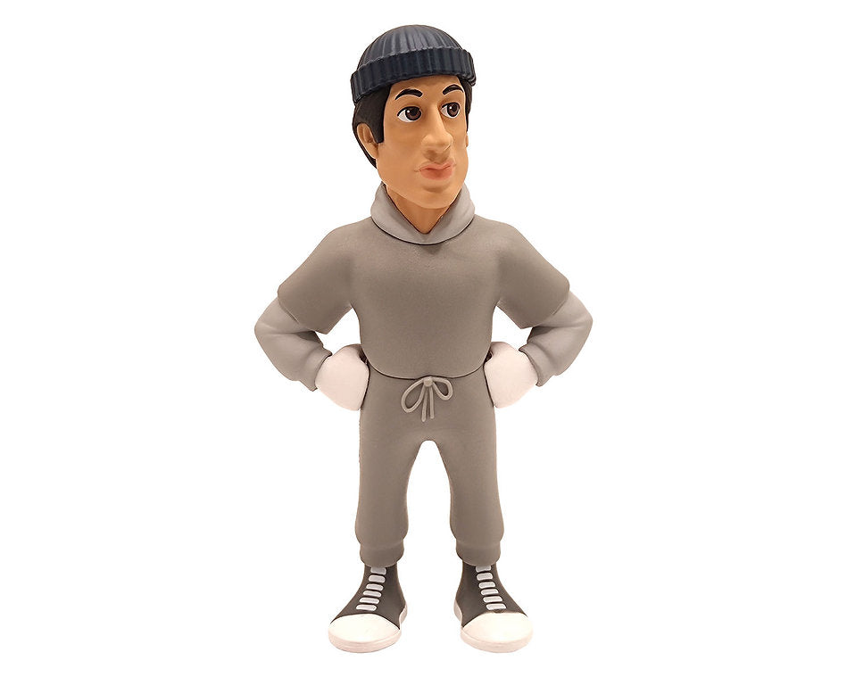 Minix Rocky Balboa vinyl figure in gray hooded sweatsuit with white boxing gloves and black sneakers posed with hands on hips