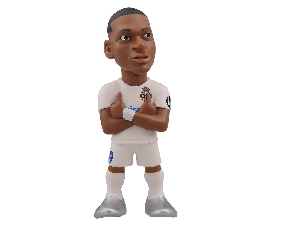 Side angle showing the figure’s hairstyle, jersey details, and clenched fists in mid-celebration pose