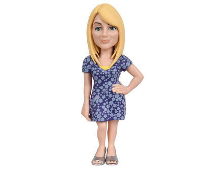Rear view of Penny figure showing long blonde hair