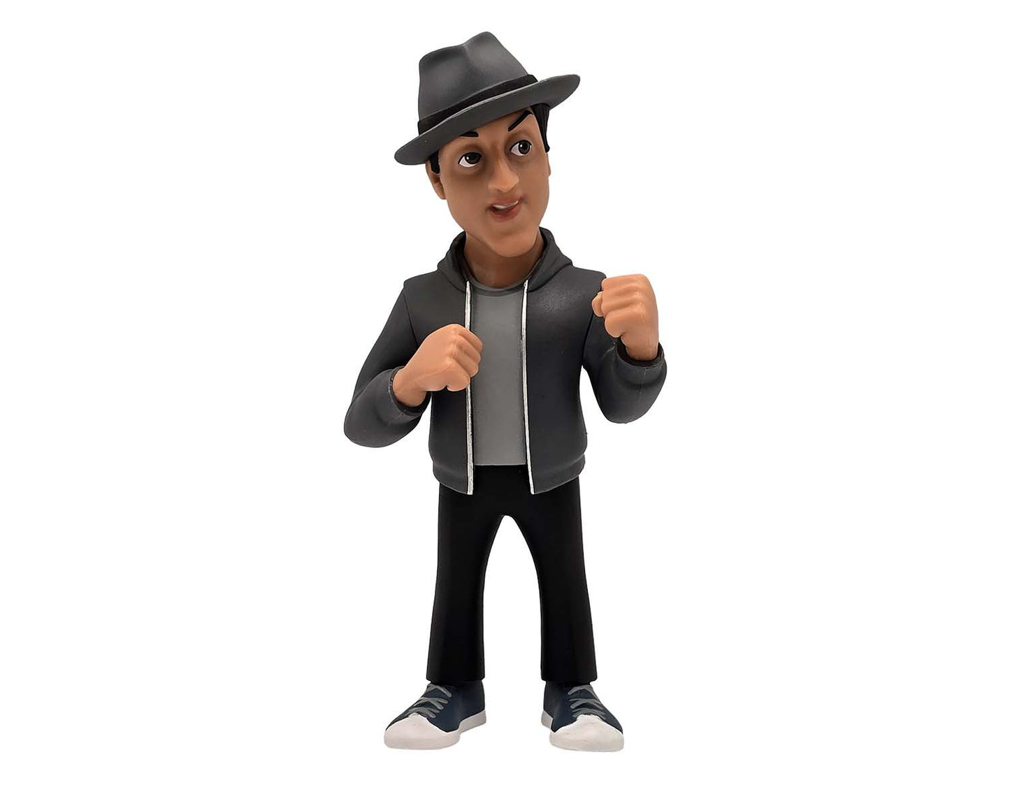 Side angle showing facial detail, raised eyebrow, and jacket wrinkles