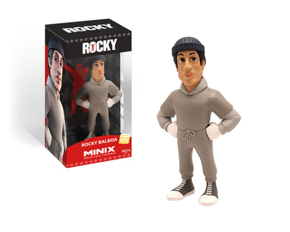 Minix Rocky Balboa collectible figurine in a gray sweatsuit and black beanie presented next to its clear display box