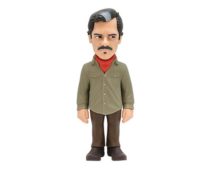 Side angle showing the figure’s slicked-back hair, stern expression, and detailed creases on the shirt