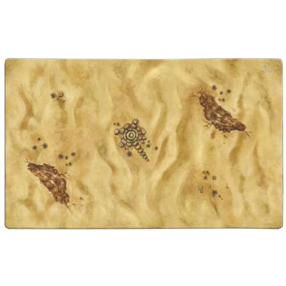 A desert playmat features sandy-colored terrain with two large brown organic shapes, a central circular patterned object, and numerous small dark dots