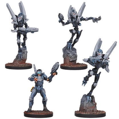Four painted sci-fi miniatures: three dark, winged alien figures dynamically posed with guns, and one human in blue armor holding a gun