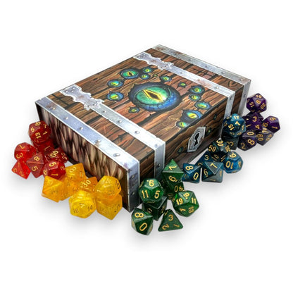 Wooden treasure chest dice box featuring a central dragon eye, surrounded by red, yellow, green, blue, and purple polyhedral RPG dice sets