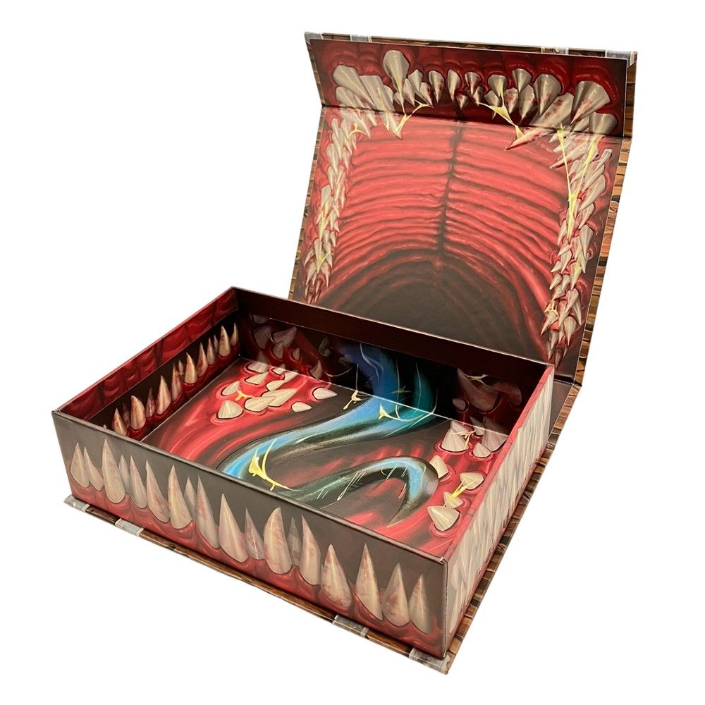 Open monster box illustrated with rows of sharp teeth and red flesh, the base features a stylized blue serpentine design