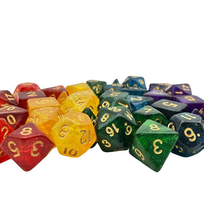 Glitter rainbow polyhedral RPG dice pile (D20, D12, D8), including red, yellow, green, blue, and purple with gold numbers