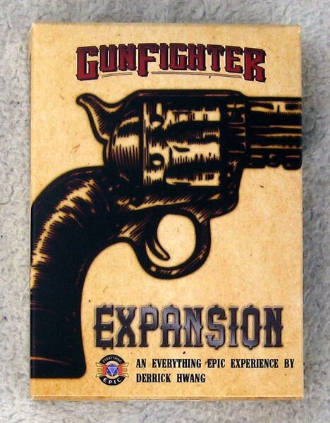 Gunfighter Expansion board game box with a revolver graphic