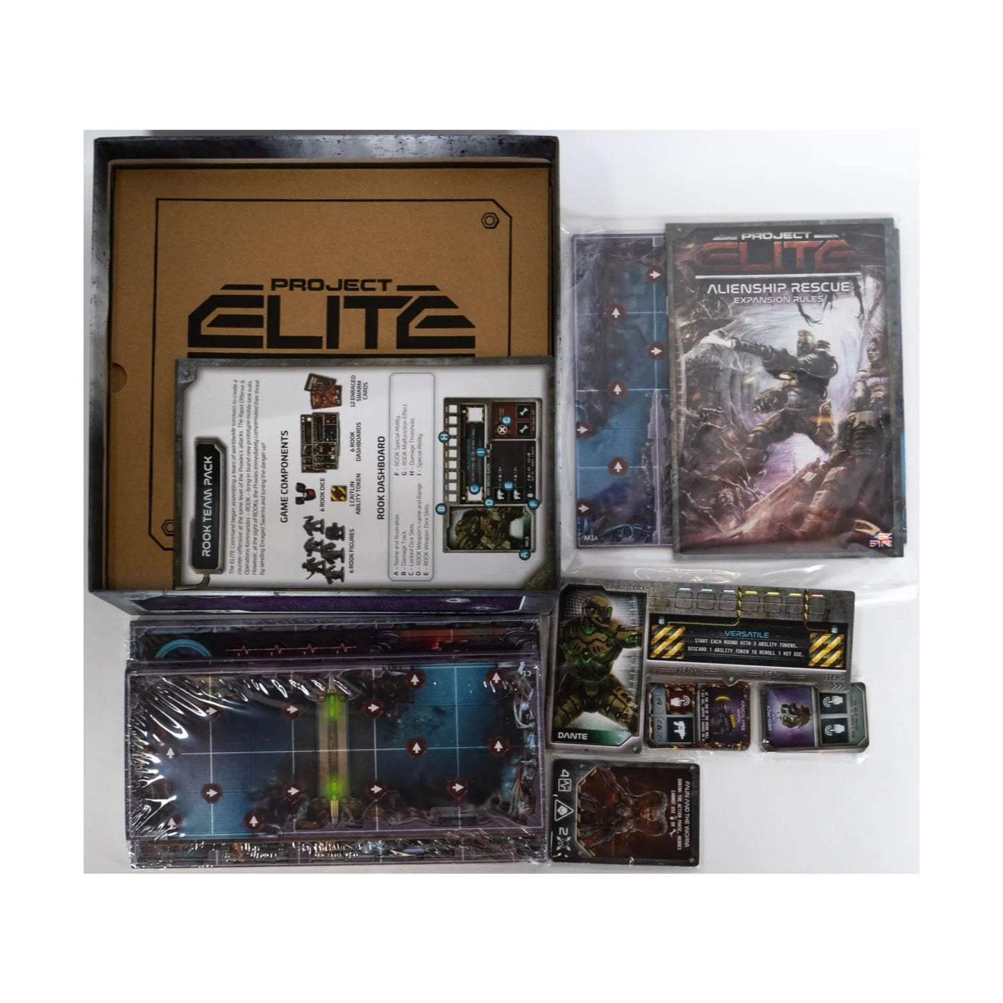 Overhead view of Project ELITE and Alienship Rescue game components: box, rulebooks, boards, and cards