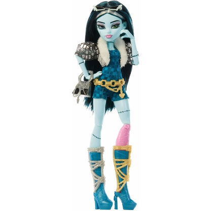 Monster High Frankie Stein doll with light blue stitched skin, dark hair, plaid romper, silver jacket, gold belt, pink prosthetic leg, and mismatched blue boots