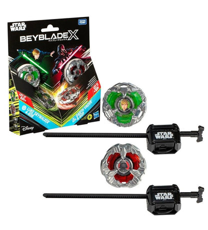 Green Luke Skywalker and red Darth Vader Star Wars Beyblade X tops with launchers, plus their box