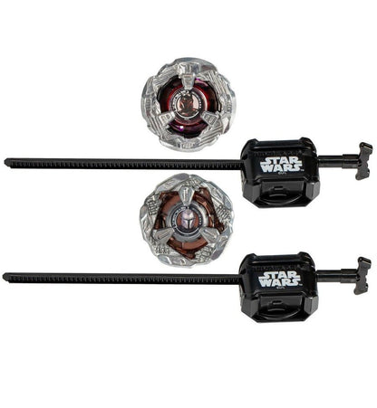Two Star Wars battle top sets, each with a metallic top, black launcher, and ripcord, tops feature character helmets