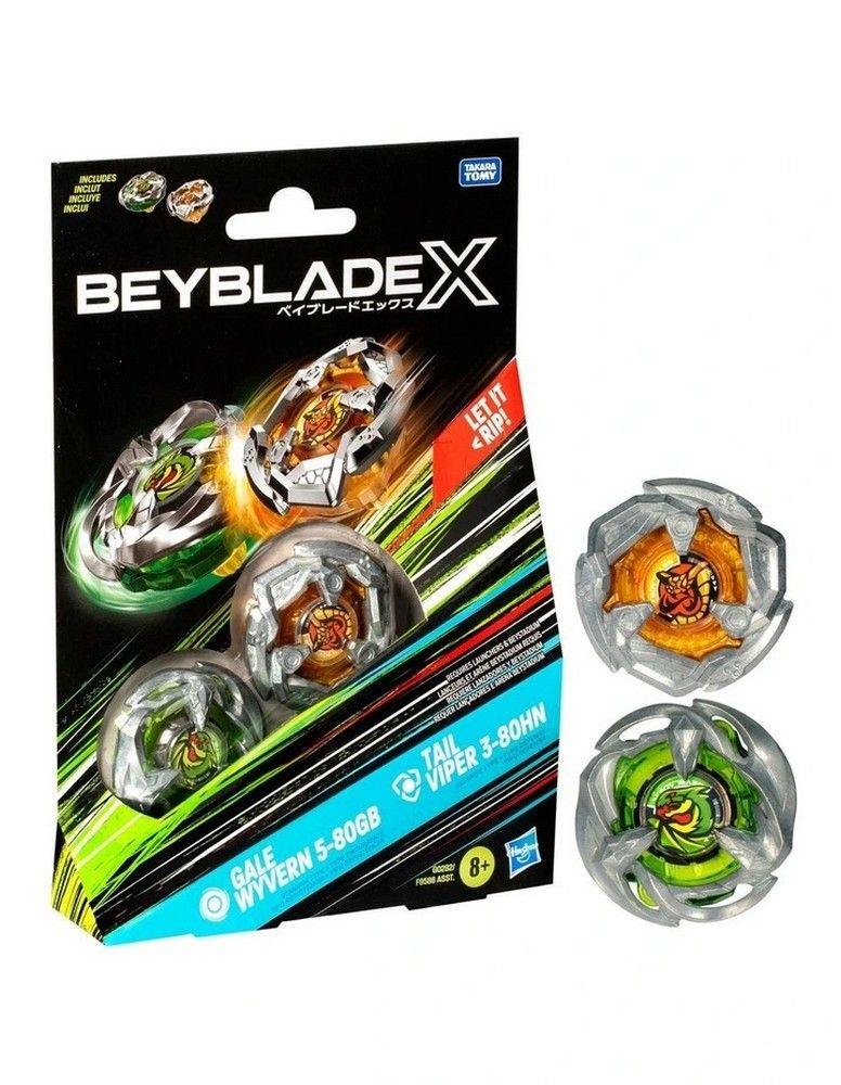 A Beyblade X toy set. Black packaging displays green and orange Beyblade tops, which are also shown separately
