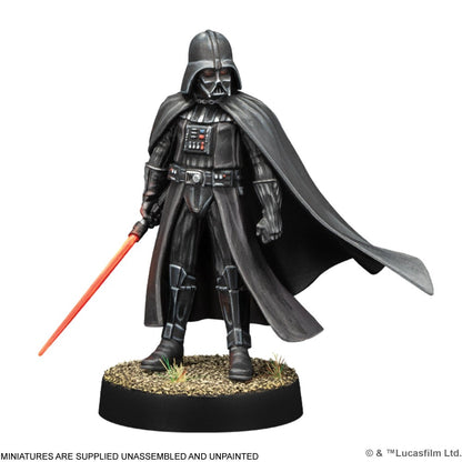 Darth Vader miniature in black armor and cape, brandishing an ignited red lightsaber