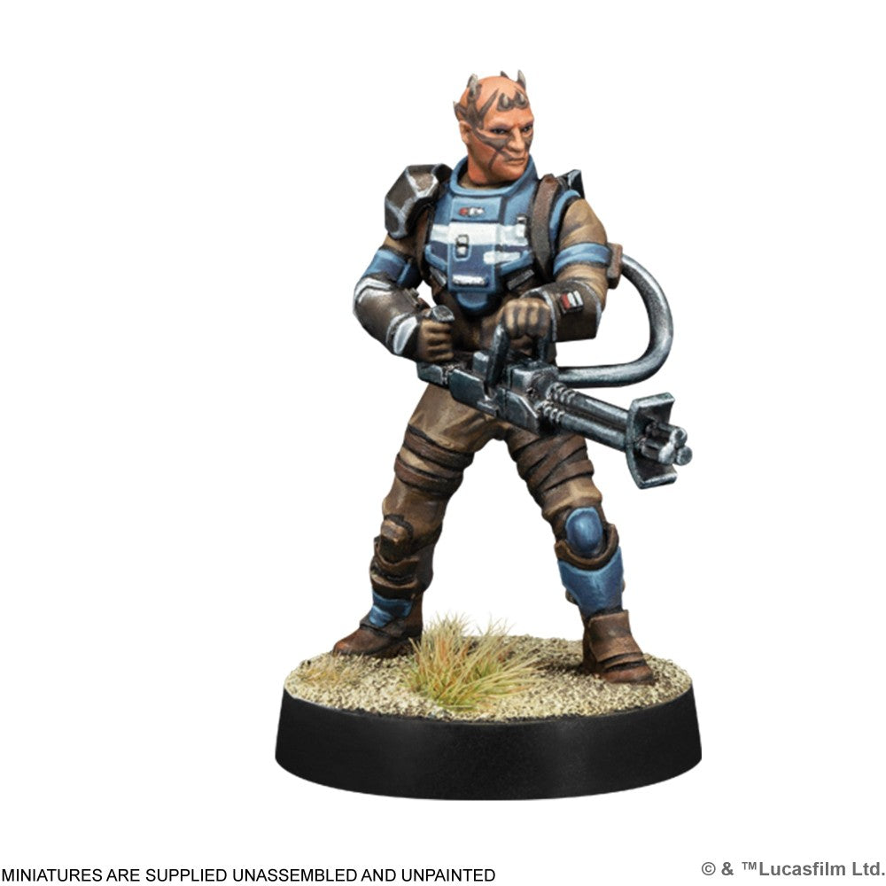 Star Wars miniature of an armored alien soldier holding a heavy blaster cannon