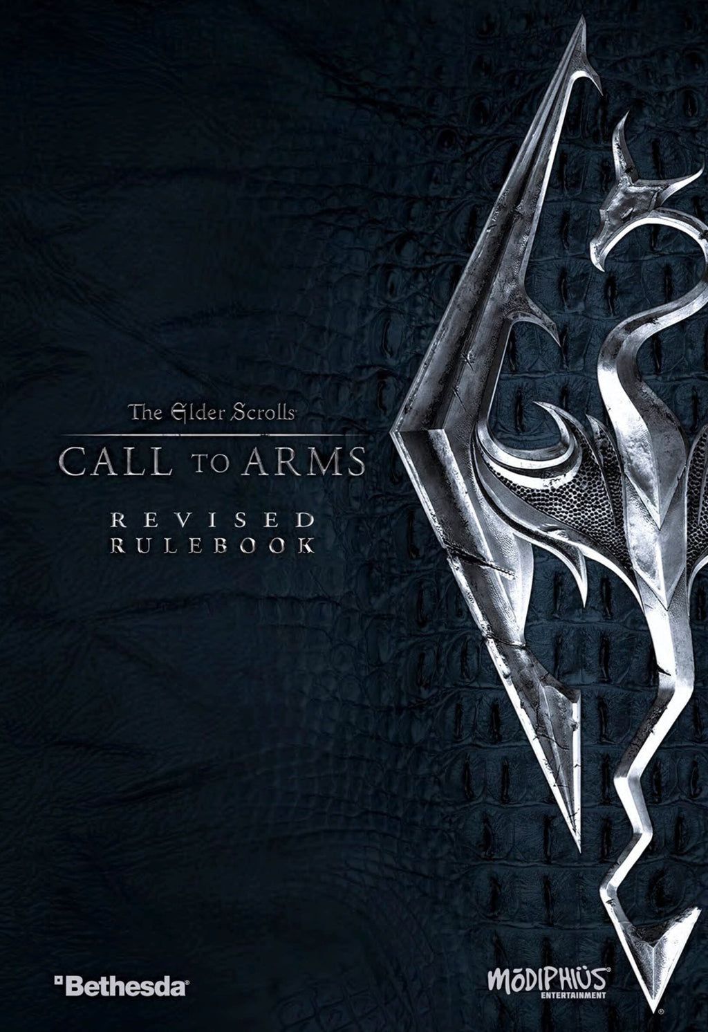 The Elder Scrolls Call to Arms Revised Rulebook cover: metallic dragon head and wings logo on a dark, textured background