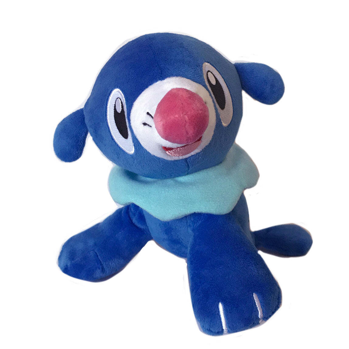 Blue Popplio plush toy from PokÃ©mon, featuring its pink nose and light blue ruff